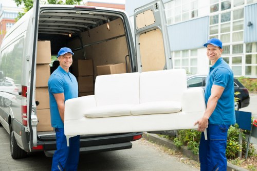 Removal services team working in Belsizepark street