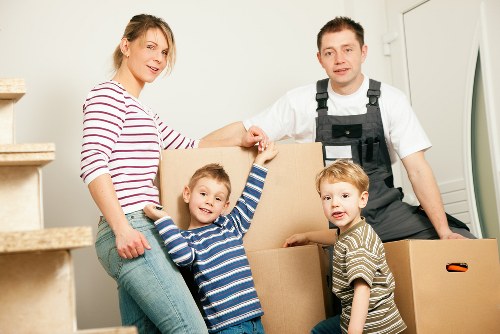 Moving team loading items safely into a van