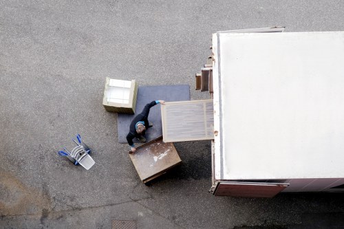 Man With Van Belsizepark team sorting reusable and recyclable items during a move