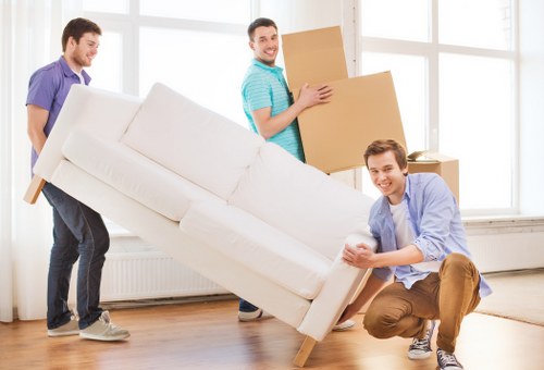 Careful loading of unwanted furniture for local collection in Belsize Park