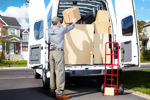Local transfer station handling separated cardboard, metal, and household waste