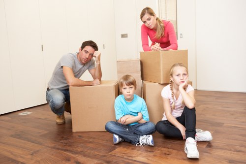 Packing boxes and fragile items for a flat removal in Belsizepark